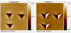 Topography and gradient views of impressions on aluminum using a Berkovich probe